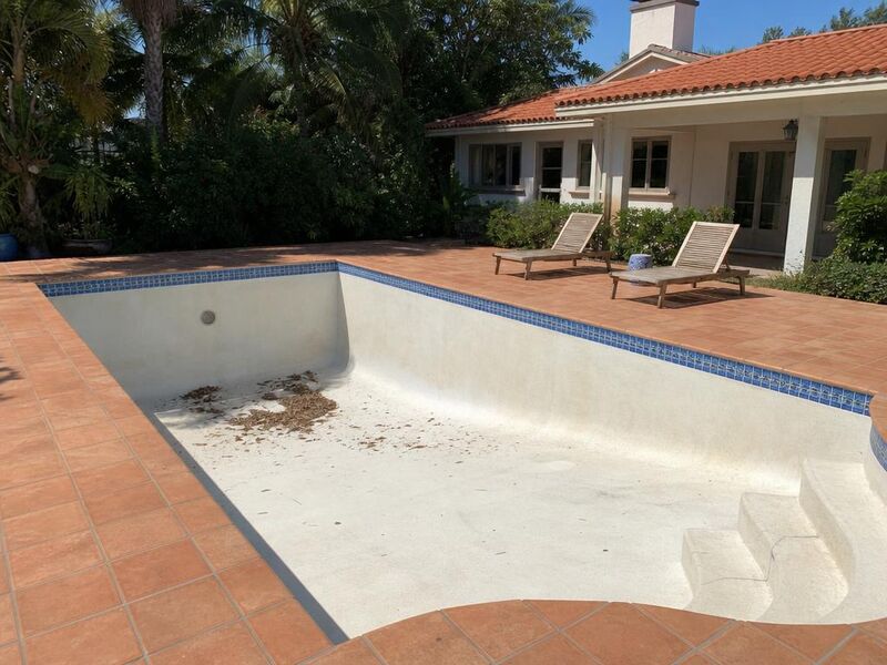 Before — A drained pool filled with believable water.