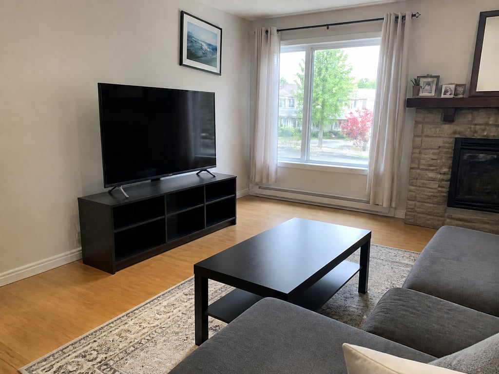 A living room shown with clutter and then with the clutter removed.