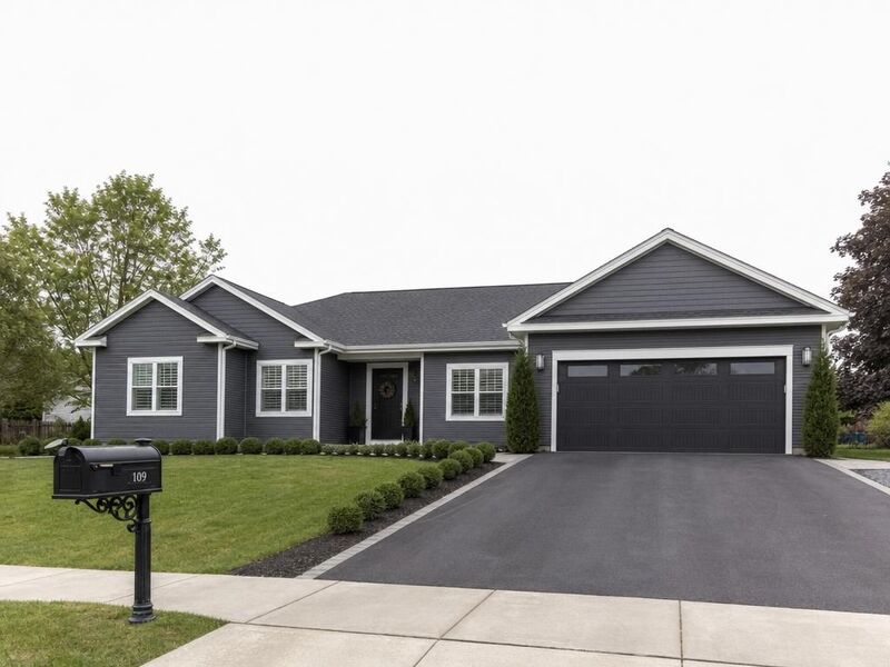 Before — An exterior with a flat overcast sky replaced by a clear afternoon sky.
